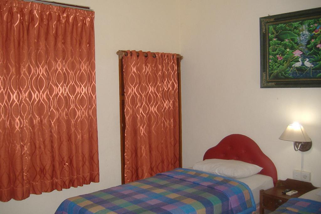 Mustika Inn Kuta  Ruang foto