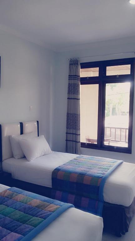 Mustika Inn Kuta  Ruang foto