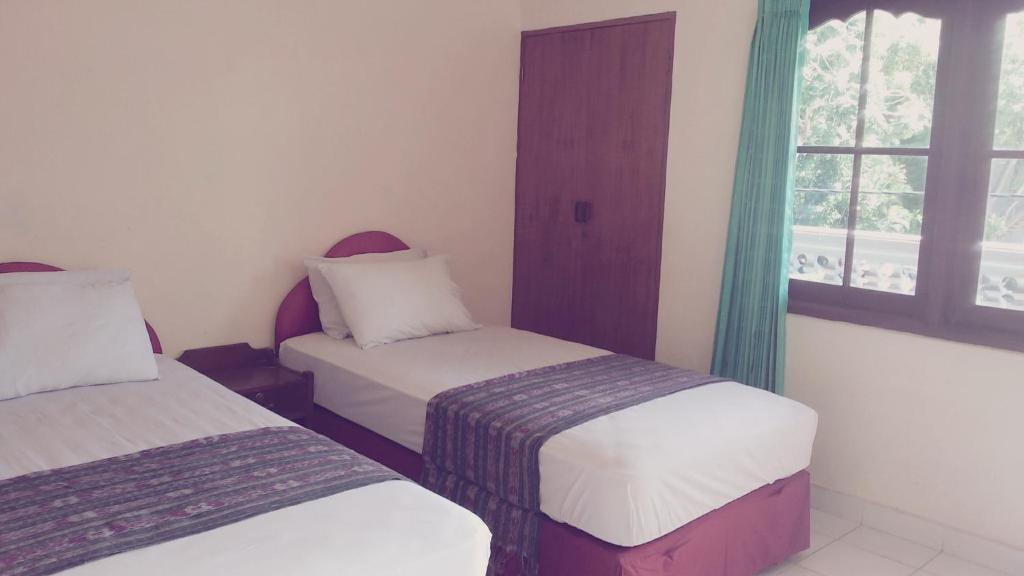 Mustika Inn Kuta  Ruang foto